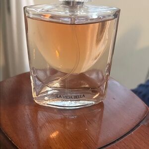 Pour Femme Perfume - Elegant Peach Fragrance a couple of sprays out of it